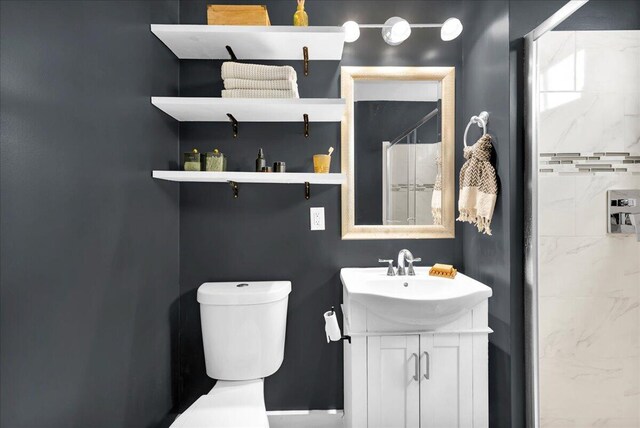 44 Bridge St, Bucksport, ME 04416 - full bathroom with toilet, vanity, and a shower