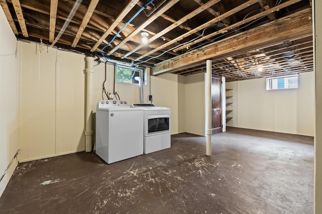 127 Lake St, Auburn, ME 04210 - below grade area featuring separate washer and dryer and plenty of natural light