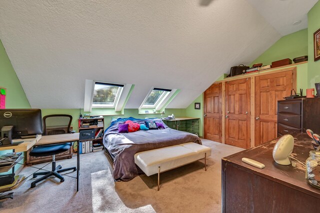 42 Lee Dr, Albion, ME 04910 - bedroom with a desk, lofted ceiling, carpet flooring, and a textured ceiling