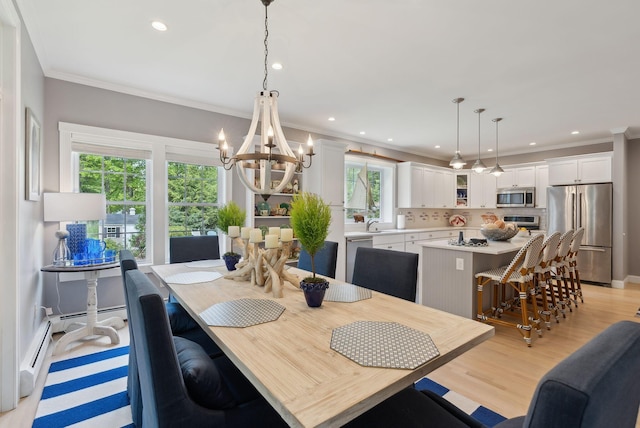 18 Forest Hill Ln, Kennebunk, ME 04043 - dining area featuring ornamental molding, a chandelier, recessed lighting, and light wood-type flooring