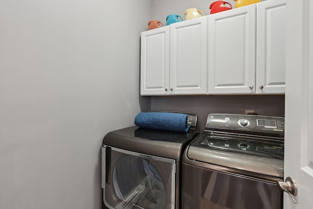 18 Forest Hill Ln, Kennebunk, ME 04043 - laundry area with cabinet space and washer and clothes dryer