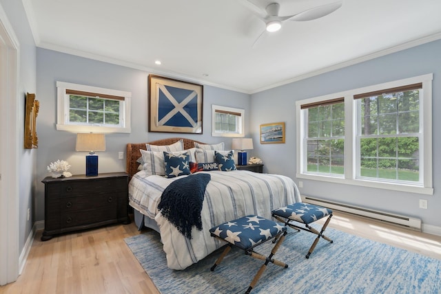 18 Forest Hill Ln, Kennebunk, ME 04043 - bedroom featuring a baseboard radiator, crown molding, light wood-type flooring, baseboards, and recessed lighting