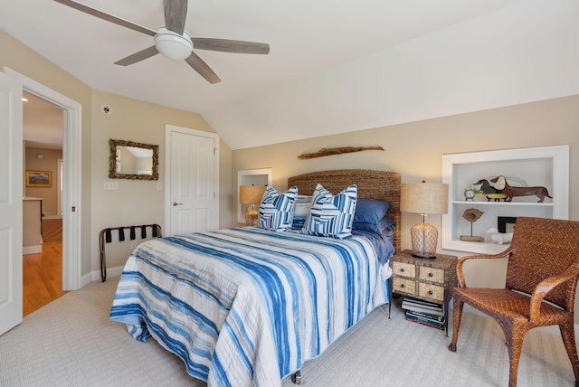 18 Forest Hill Ln, Kennebunk, ME 04043 - carpeted bedroom featuring a ceiling fan, vaulted ceiling, and baseboards