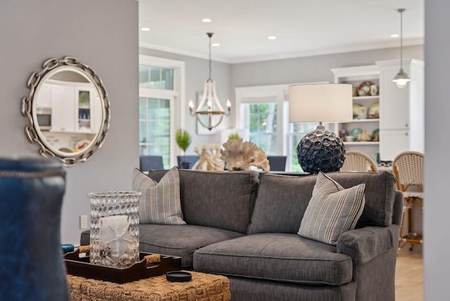 18 Forest Hill Ln, Kennebunk, ME 04043 - living area with a chandelier, recessed lighting, light wood-style flooring, and ornamental molding