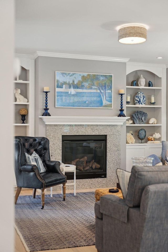 18 Forest Hill Ln, Kennebunk, ME 04043 - living room with crown molding, built in features, and a premium fireplace