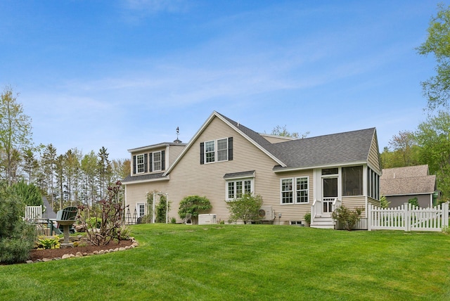 18 Forest Hill Ln, Kennebunk, ME 04043 - back of house with a shingled roof, a sunroom, and entry steps