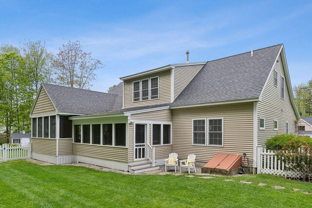18 Forest Hill Ln, Kennebunk, ME 04043 - back of house featuring a sunroom, roof with shingles, and entry steps