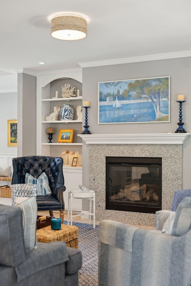 18 Forest Hill Ln, Kennebunk, ME 04043 - living room with crown molding, a high end fireplace, and built in features