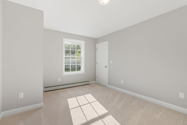 15 Essex St, Westbrook, ME 04092 - carpeted empty room featuring baseboard heating and baseboards