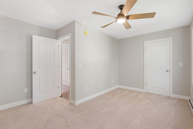 15 Essex St, Westbrook, ME 04092 - unfurnished bedroom featuring light carpet, baseboards, and a ceiling fan