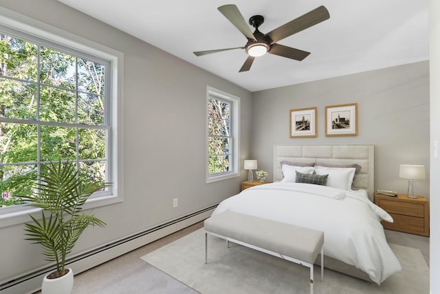 15 Essex St, Westbrook, ME 04092 - carpeted bedroom featuring a baseboard radiator and ceiling fan