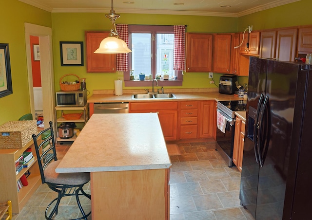 129 Libby St, Pittsfield, ME 04967 - kitchen with stainless steel appliances, a sink, light countertops, a center island, and decorative light fixtures