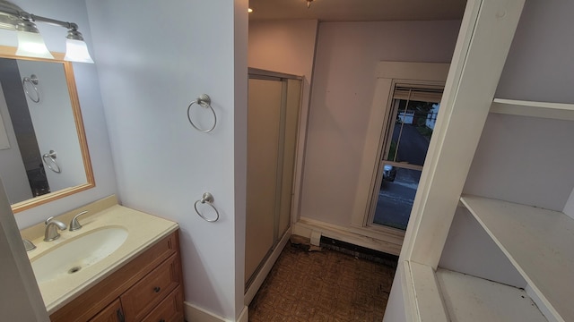 129 Libby St, Pittsfield, ME 04967 - full bath with vanity, an enclosed shower, and baseboards