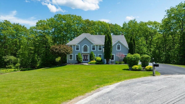 59 Sanderson Rd, Poland, ME 04274 - colonial home with a front yard