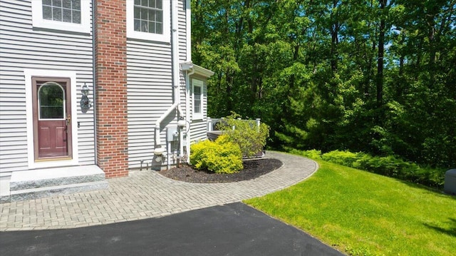 59 Sanderson Rd, Poland, ME 04274 - property entrance featuring a yard