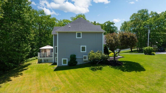 59 Sanderson Rd, Poland, ME 04274 - view of side of property featuring a gazebo, a lawn, a cooling unit, and a deck