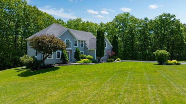 59 Sanderson Rd, Poland, ME 04274 - colonial inspired home featuring a front yard