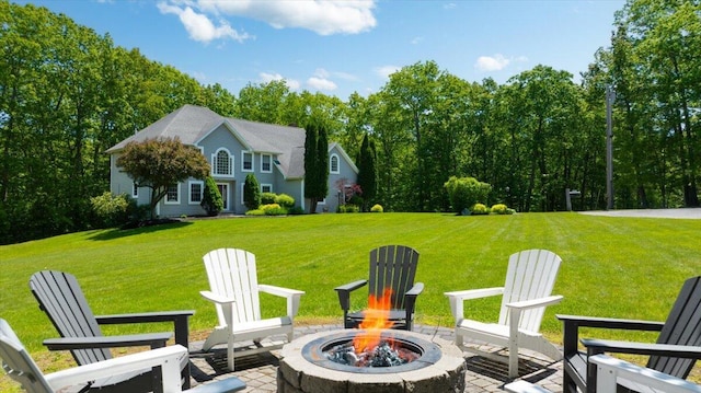 59 Sanderson Rd, Poland, ME 04274 - view of patio featuring an outdoor fire pit