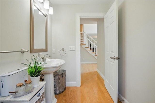 59 Sanderson Rd, Poland, ME 04274 - bathroom featuring wood finished floors and baseboards