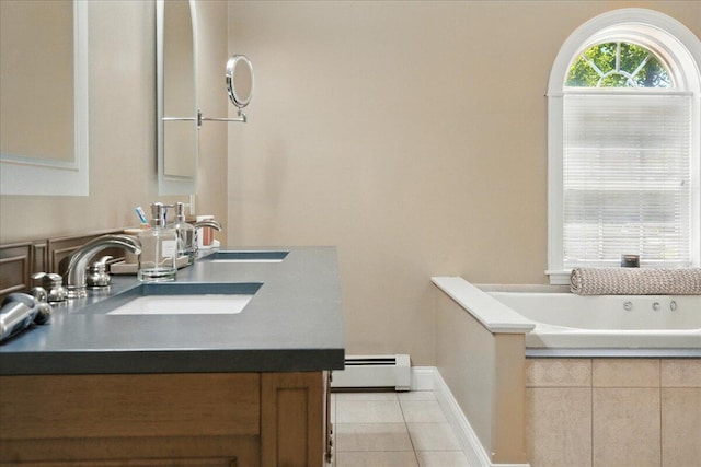 59 Sanderson Rd, Poland, ME 04274 - bathroom with a baseboard heating unit, double vanity, tile patterned flooring, and a garden tub
