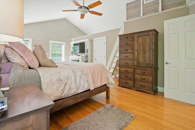 59 Sanderson Rd, Poland, ME 04274 - bedroom with light wood-style flooring, a ceiling fan, high vaulted ceiling, and a closet
