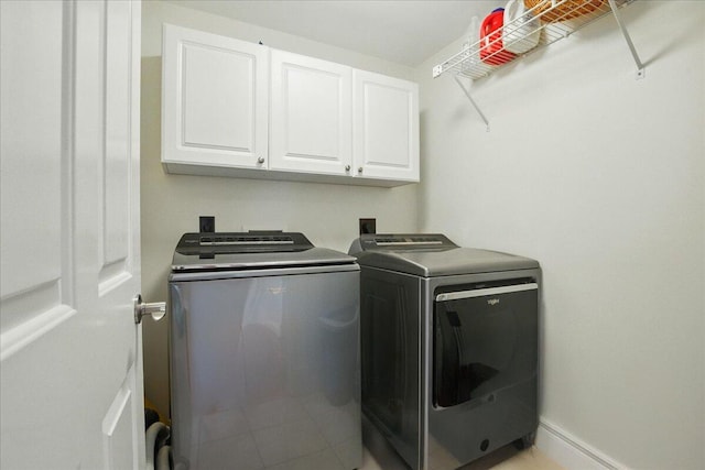 59 Sanderson Rd, Poland, ME 04274 - laundry room with cabinet space and washing machine and clothes dryer