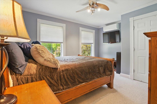 59 Sanderson Rd, Poland, ME 04274 - carpeted bedroom featuring a wall unit AC, ornamental molding, ceiling fan, and baseboards