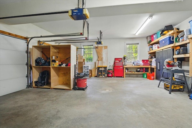 59 Sanderson Rd, Poland, ME 04274 - garage featuring a garage door opener