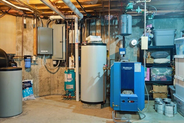 59 Sanderson Rd, Poland, ME 04274 - utility room with water heater and a heating unit