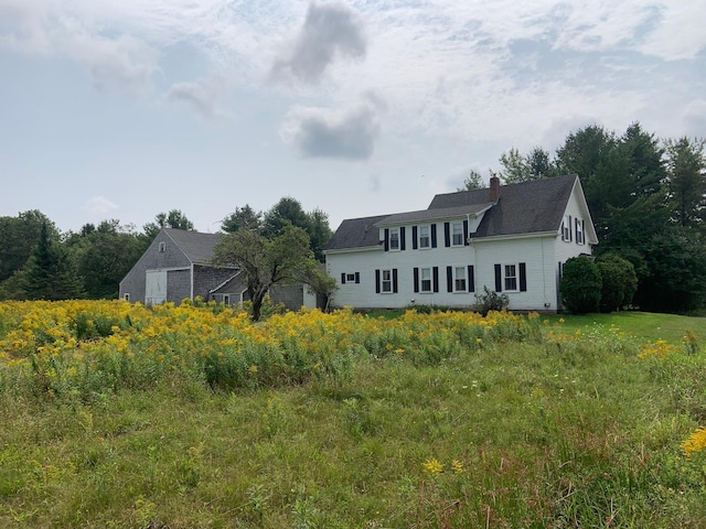 100 Bayside Rd, Ellsworth, ME 04605 - view of front of house with a chimney