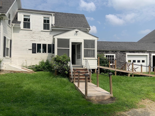 100 Bayside Rd, Ellsworth, ME 04605 - view of front facade with a sunroom, a shingled roof, and a front lawn