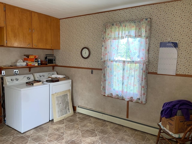 100 Bayside Rd, Ellsworth, ME 04605 - laundry room featuring ornamental molding, washing machine and clothes dryer, wallpapered walls, baseboard heating, and cabinet space