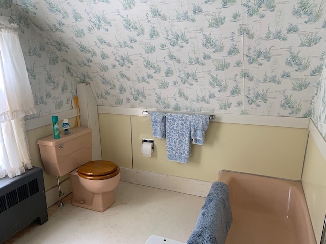 100 Bayside Rd, Ellsworth, ME 04605 - bathroom with wallpapered walls, radiator heating unit, toilet, and wainscoting