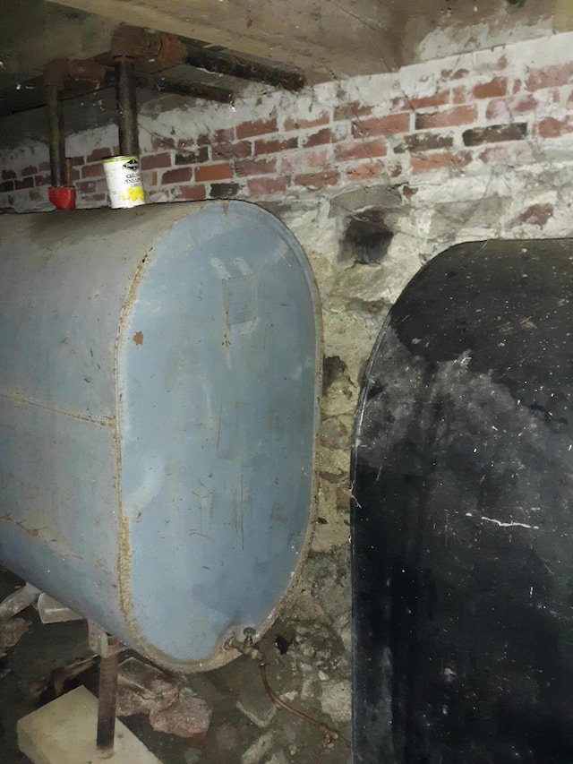 100 Bayside Rd, Ellsworth, ME 04605 - basement view of oil tank