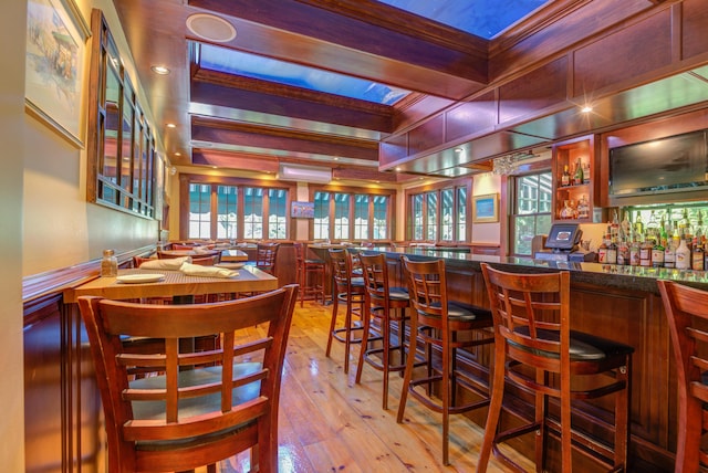 200 Shore Rd, Ogunquit, ME 03907 - community bar area with hardwood / wood-style flooring, coffered ceiling, crown molding, plenty of natural light, and beam ceiling