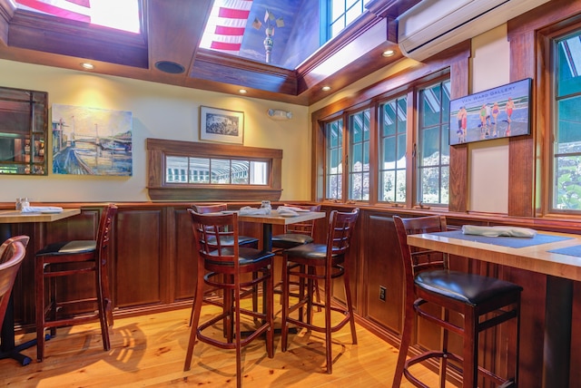 200 Shore Rd, Ogunquit, ME 03907 - indoor dry bar featuring an AC wall unit, light wood-type flooring, and recessed lighting