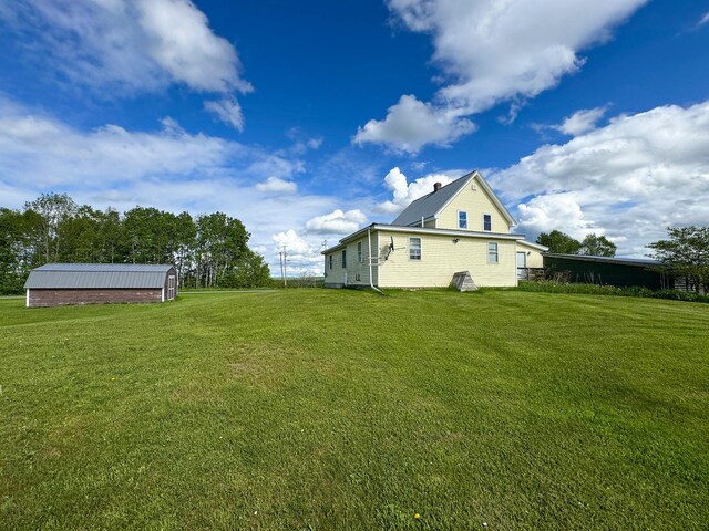 164 Mud Pond Road, Prentiss Twp T7 R3 Nbpp, ME 04487 - view of green lawn featuring an outbuilding
