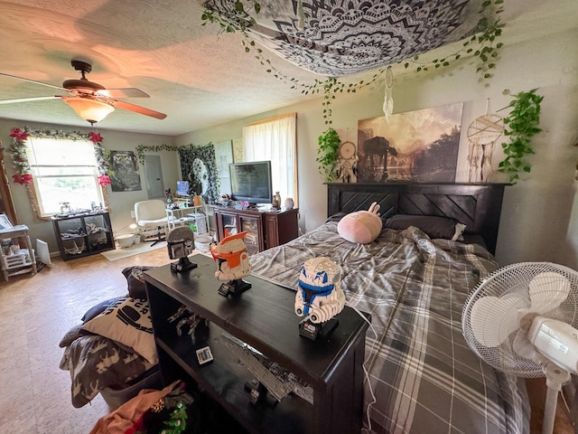 164 Mud Pond Road, Prentiss Twp T7 R3 Nbpp, ME 04487 - bedroom with a ceiling fan