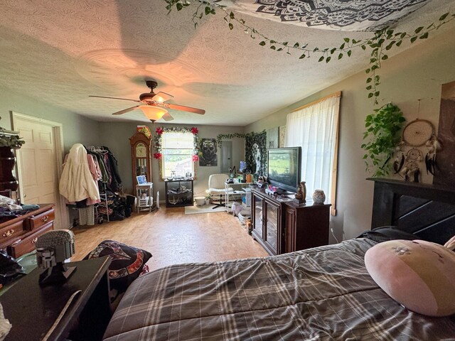 164 Mud Pond Road, Prentiss Twp T7 R3 Nbpp, ME 04487 - bedroom with a ceiling fan and a textured ceiling