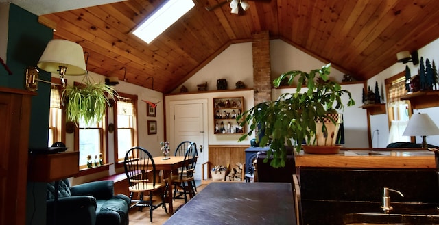 10 Rines Rd, Burnham, ME 04922 - dining room with lofted ceiling, wooden ceiling, and a skylight