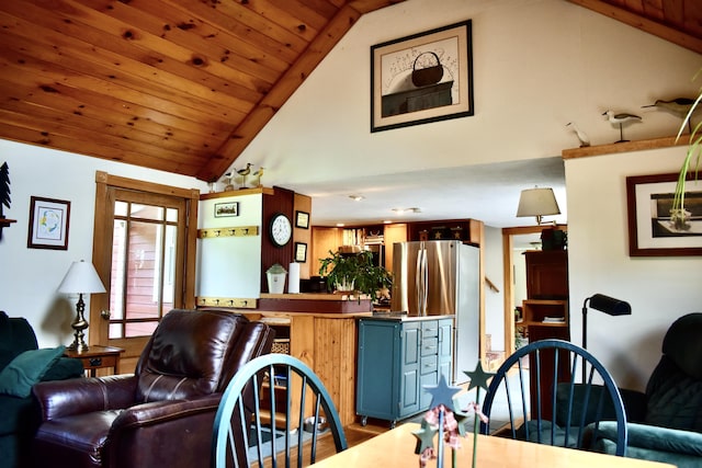10 Rines Rd, Burnham, ME 04922 - living room with high vaulted ceiling, wooden ceiling, and wood finished floors