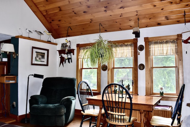 10 Rines Rd, Burnham, ME 04922 - dining room with lofted ceiling, wooden ceiling, baseboards, and wood finished floors