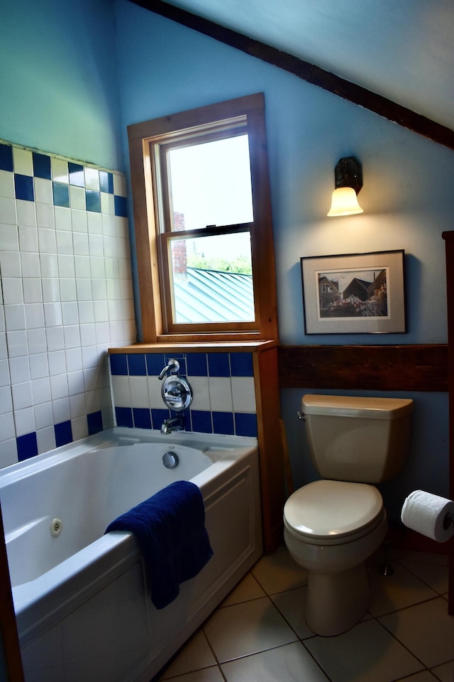 10 Rines Rd, Burnham, ME 04922 - bathroom with a whirlpool tub, toilet, and tile patterned flooring