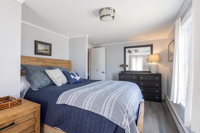 116 Hills Beach Rd, Biddeford, ME 04005 - carpeted bedroom with a baseboard heating unit and ornamental molding