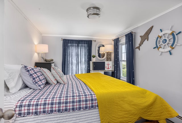 116 Hills Beach Rd, Biddeford, ME 04005 - bedroom with ornamental molding and a baseboard heating unit