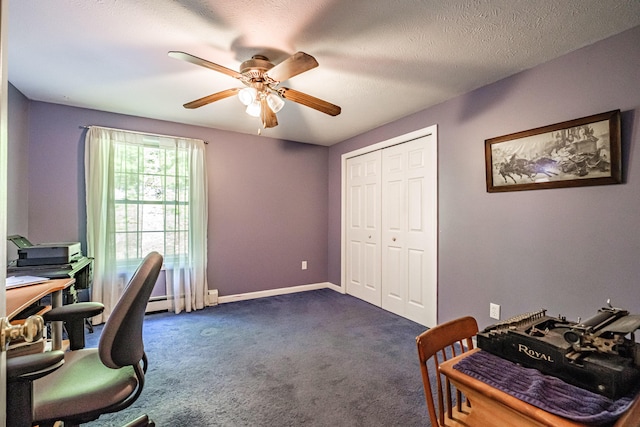 739 Spec Pond Rd, Porter, ME 04068 - home office with a ceiling fan, dark colored carpet, and baseboards