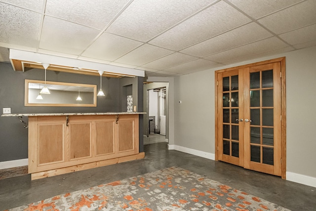 739 Spec Pond Rd, Porter, ME 04068 - bar area with a drop ceiling, baseboards, finished concrete floors, and french doors