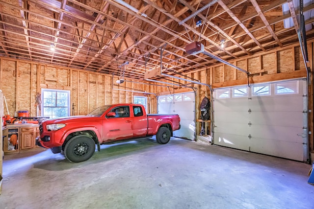 739 Spec Pond Rd, Porter, ME 04068 - garage featuring a garage door opener