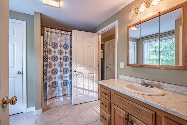 739 Spec Pond Rd, Porter, ME 04068 - full bath featuring vanity, tile patterned flooring, a shower with curtain, and baseboards