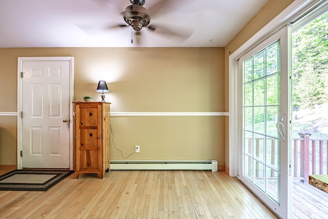 739 Spec Pond Rd, Porter, ME 04068 - unfurnished room featuring baseboard heating, hardwood / wood-style flooring, and ceiling fan
